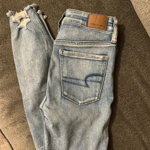 American Eagle Next Level Stretch Ripped Light Blue Jeans - Size US 2 Regular